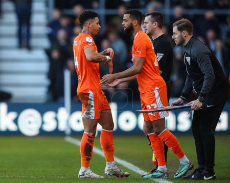 Photo for Jordan Lawrence-Gabriel of Blackpool is replaced by CJ Hamilton of Blackpool during the Sky Bet League 1 match Derby County vs Blackpool at Pride Park Stadium, Derby, United Kingdom, 29th March 202 - Royalty Free Image