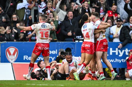 Photo for Konrad Hurrell of St. Helens goes over for a try during the Betfred Super League Round 6 match St Helens vs Wigan Warriors at Totally Wicked Stadium, St Helens, United Kingdom, 29th March 202 - Royalty Free Image