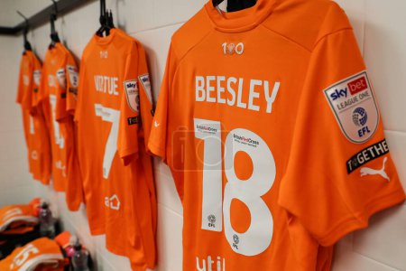 Photo for The home shirt of Blackpool players hanging up in the changing room ahead of the Sky Bet League 1 match Derby County vs Blackpool at Pride Park Stadium, Derby, United Kingdom, 29th March 202 - Royalty Free Image