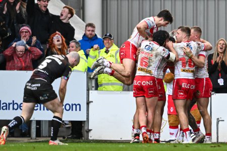 Photo for Konrad Hurrell of St. Helens celebrates his try during the Betfred Super League Round 6 match St Helens vs Wigan Warriors at Totally Wicked Stadium, St Helens, United Kingdom, 29th March 202 - Royalty Free Image