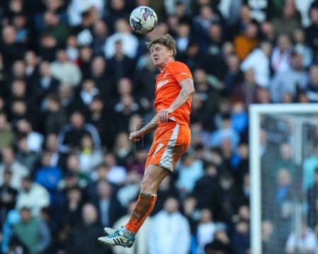 Photo for George Byers of Blackpool heads the ball  during the Sky Bet League 1 match Derby County vs Blackpool at Pride Park Stadium, Derby, United Kingdom, 29th March 202 - Royalty Free Image