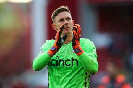 Photo for Dean Henderson of Crystal Palace applauds the travelling fans after the game during the Premier League match Nottingham Forest vs Crystal Palace at City Ground, Nottingham, United Kingdom, 30th March 202 - Royalty Free Image