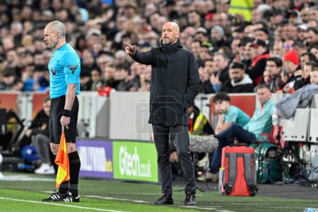 Photo for Erik ten Hag manager of Manchester United gives his team instructions during the Premier League match Brentford vs Manchester United at The Gtech Community Stadium, London, United Kingdom, 30th March 202 - Royalty Free Image
