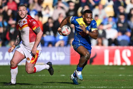 Photo for Rodrick Tai of Warrington Wolves makes a break during the Betfred Super League match Warrington Wolves vs Catalans Dragons at Halliwell Jones Stadium, Warrington, United Kingdom, 30th March 202 - Royalty Free Image