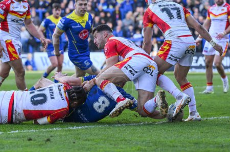 Photo for James Harrison of Warrington Wolves goes over for a try during the Betfred Super League match Warrington Wolves vs Catalans Dragons at Halliwell Jones Stadium, Warrington, United Kingdom, 30th March 202 - Royalty Free Image