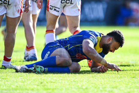 Photo for Zane Musgrove of Warrington Wolves goes down with an injury during the Betfred Super League match Warrington Wolves vs Catalans Dragons at Halliwell Jones Stadium, Warrington, United Kingdom, 30th March 202 - Royalty Free Image