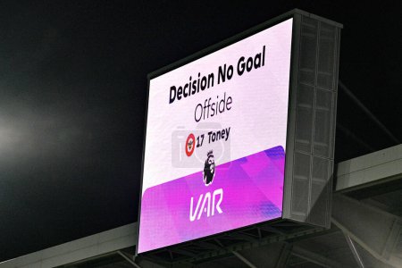 Photo for VAR give no goal to Ivan Toney of Brentford for offside during the Premier League match Brentford vs Manchester United at The Gtech Community Stadium, London, United Kingdom, 30th March 202 - Royalty Free Image