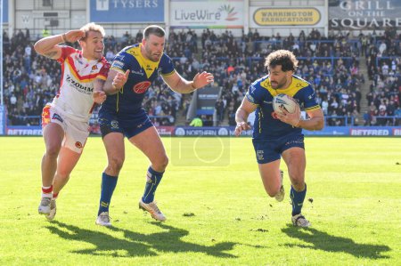Photo for Toby King of Warrington Wolves runs into score a try during the Betfred Super League match Warrington Wolves vs Catalans Dragons at Halliwell Jones Stadium, Warrington, United Kingdom, 30th March 202 - Royalty Free Image