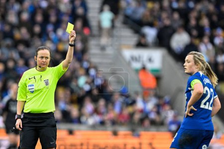 Photo for Erin Cuthbert of Chelsea Women is shown a yellow card by referee Cheryl Foster during the FA Women's League Cup Final match Arsenal Women vs Chelsea FC Women at Molineux, Wolverhampton, United Kingdom, 31st March 202 - Royalty Free Image