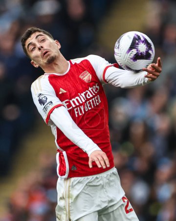 Photo for Kai Havertz of Arsenal controls the ball with his arm during the Premier League match Manchester City vs Arsenal at Etihad Stadium, Manchester, United Kingdom, 31st March 202 - Royalty Free Image