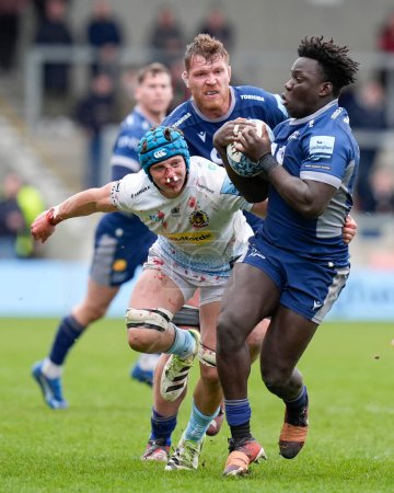 Photo for Asher Opoku-Fordjour of Sale Sharks breaks past Ross Vintcent of Exeter Chiefs during the Gallagher Premiership match Sale Sharks vs Exeter Chiefs at Salford Community Stadium, Eccles, United Kingdom, 31st March 202 - Royalty Free Image
