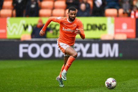 Photo for CJ Hamilton of Blackpool makes a break with the ball during the Sky Bet League 1 match Blackpool vs Wycombe Wanderers at Bloomfield Road, Blackpool, United Kingdom, 1st April 202 - Royalty Free Image