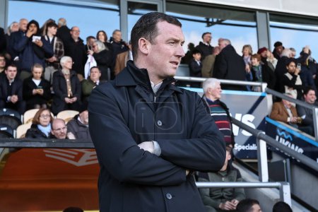 Photo for Neill Collins Head coach of Barnsley looks on during the Sky Bet League 1 match Burton Albion vs Barnsley at Pirelli Stadium, Burton upon Trent, United Kingdom, 1st April 202 - Royalty Free Image