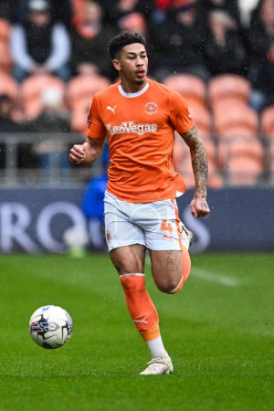 Photo for Jordan Lawrence-Gabriel of Blackpool makes a break with the ball during the Sky Bet League 1 match Blackpool vs Wycombe Wanderers at Bloomfield Road, Blackpool, United Kingdom, 1st April 202 - Royalty Free Image