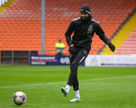 Photo for CJ Hamilton of Blackpool during the pre-game warmup ahead of the Sky Bet League 1 match Blackpool vs Wycombe Wanderers at Bloomfield Road, Blackpool, United Kingdom, 1st April 202 - Royalty Free Image