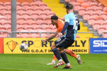 Photo for Jordan Lawrence-Gabriel of Blackpool shoots on goal during the Sky Bet League 1 match Blackpool vs Wycombe Wanderers at Bloomfield Road, Blackpool, United Kingdom, 1st April 202 - Royalty Free Image