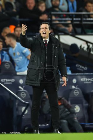 Photo for Unai Emery Manager of Aston Villa gives his team instructions during the Premier League match Manchester City vs Aston Villa at Etihad Stadium, Manchester, United Kingdom, 3rd April 202 - Royalty Free Image