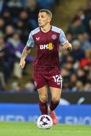 Photo for Lucas Digne of Aston Villa makes a break with the ball during the Premier League match Manchester City vs Aston Villa at Etihad Stadium, Manchester, United Kingdom, 3rd April 202 - Royalty Free Image