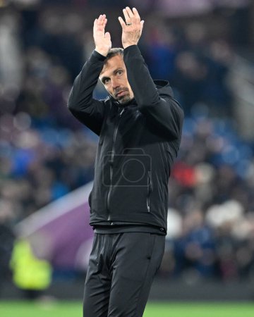 Photo for Gary O'Neil manager of Wolverhampton Wanderers claps fans at full time, during the Premier League match Burnley vs Wolverhampton Wanderers at Turf Moor, Burnley, United Kingdom, 2nd April 202 - Royalty Free Image