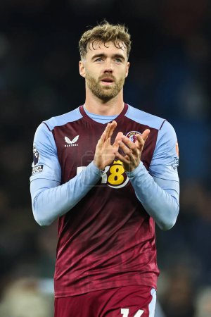 Photo for Calum Chambers of Aston Villa applauds the fans at the end of the Premier League match Manchester City vs Aston Villa at Etihad Stadium, Manchester, United Kingdom, 3rd April 202 - Royalty Free Image