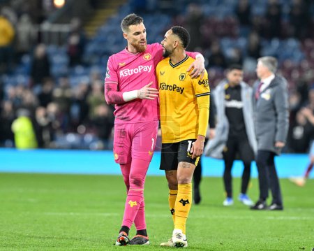 Photo for Jos S of Wolverhampton Wanderers and Matheus Cunha of Wolverhampton Wanderers at full time, during the Premier League match Burnley vs Wolverhampton Wanderers at Turf Moor, Burnley, United Kingdom, 2nd April 2024 - Royalty Free Image