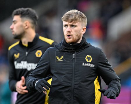 Photo for Tommy Doyle of Wolverhampton Wanderers warms up ahead of the match, during the Premier League match Burnley vs Wolverhampton Wanderers at Turf Moor, Burnley, United Kingdom, 2nd April 202 - Royalty Free Image