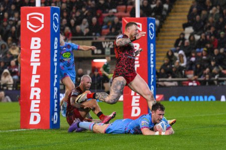Photo for Harry Smith of Wigan Warriors goes over for a try during the Betfred Super League Round 7 match Leigh Leopards vs Wigan Warriors at Leigh Sports Village, Leigh, United Kingdom, 4th April 202 - Royalty Free Image