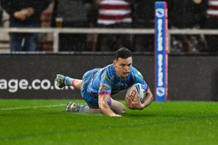Photo for Jai Field of Wigan Warriors goes over for a try during the Betfred Super League Round 7 match Leigh Leopards vs Wigan Warriors at Leigh Sports Village, Leigh, United Kingdom, 4th April 202 - Royalty Free Image