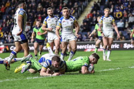 Photo for George Williams of Warrington Wolves goes over for a try to make it during the Betfred Super League Round 7 match Leeds Rhinos vs Warrington Wolves at Headingley Stadium, Leeds, United Kingdom, 5th April 202 - Royalty Free Image