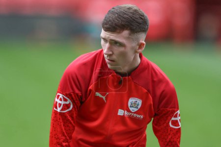 Photo for Conor Grant of Barnsley in the pregame warmup session during the Sky Bet League 1 match Charlton Athletic vs Barnsley at The Valley, London, United Kingdom, 6th April 202 - Royalty Free Image