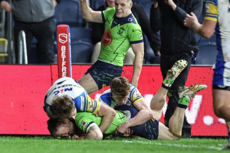 Photo for Matt Dufty of Warrington Wolves goes over for a try to make it 8-26 during the Betfred Super League Round 7 match Leeds Rhinos vs Warrington Wolves at Headingley Stadium, Leeds, United Kingdom, 5th April 202 - Royalty Free Image