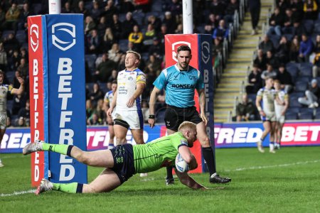 Photo for Joe Bullock of Warrington Wolves goes over for a try to make it 4-14 during the Betfred Super League Round 7 match Leeds Rhinos vs Warrington Wolves at Headingley Stadium, Leeds, United Kingdom, 5th April 202 - Royalty Free Image