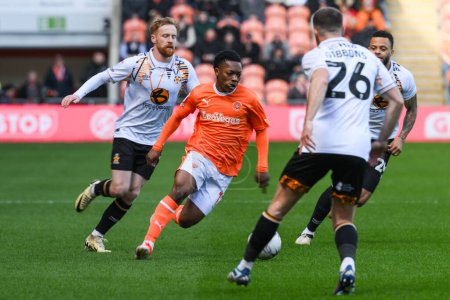 Photo for Karamoko Dembele of Blackpool makes a break with the ball during the Sky Bet League 1 match Blackpool vs Cambridge United at Bloomfield Road, Blackpool, United Kingdom, 6th April 202 - Royalty Free Image