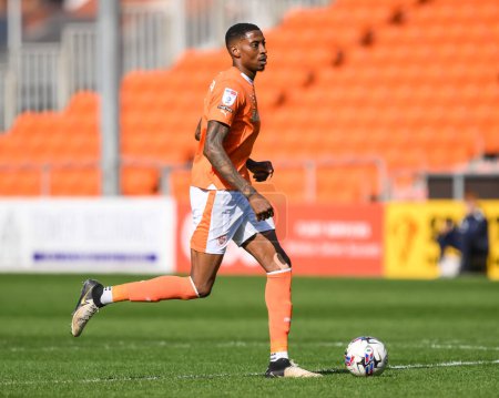 Photo for Marvin Ekpiteta of Blackpool makes a break with the ball during the Sky Bet League 1 match Blackpool vs Cambridge United at Bloomfield Road, Blackpool, United Kingdom, 6th April 202 - Royalty Free Image