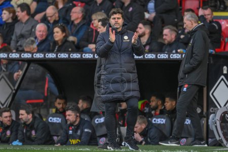 Photo for Mauricio Pochettino manager of Chelsea applauds his side during the Premier League match Sheffield United vs Chelsea at Bramall Lane, Sheffield, United Kingdom, 7th April 202 - Royalty Free Image