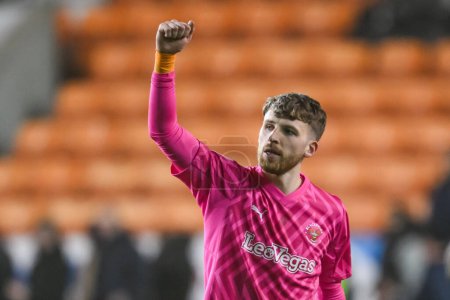 Photo for Daniel Grimshaw of Blackpool celebrates his sides win in the Sky Bet League 1 match Blackpool vs Fleetwood Town at Bloomfield Road, Blackpool, United Kingdom, 9th April 202 - Royalty Free Image