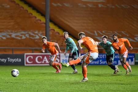 Photo for Shayne Lavery of Blackpool penalty is saved by Jay Lynch of Fleetwood Town during the Sky Bet League 1 match Blackpool vs Fleetwood Town at Bloomfield Road, Blackpool, United Kingdom, 9th April 202 - Royalty Free Image