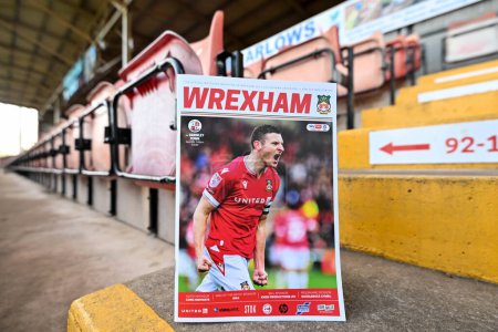 Photo for Paul Mullin of Wrexham on the cover of the match day program in the stands of the SToK Cae Ras ahead of the Sky Bet League 2 match Wrexham vs Crawley Town at SToK Cae Ras, Wrexham, United Kingdom, 9th April 202 - Royalty Free Image
