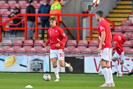 Photo for Max Cleworth of Wrexham warms up ahead of the match, during the Sky Bet League 2 match Wrexham vs Crawley Town at SToK Cae Ras, Wrexham, United Kingdom, 9th April 202 - Royalty Free Image
