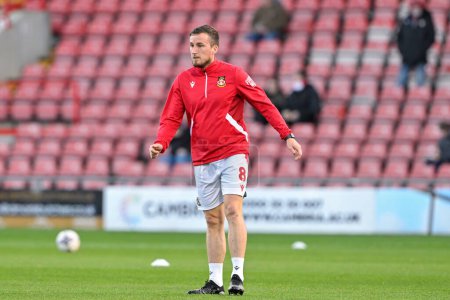 Photo for Luke Young of Wrexham warms up ahead of the match, during the Sky Bet League 2 match Wrexham vs Crawley Town at SToK Cae Ras, Wrexham, United Kingdom, 9th April 202 - Royalty Free Image