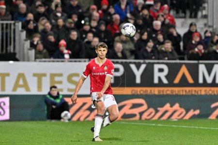 Photo for Max Cleworth of Wrexham passes the ball, during the Sky Bet League 2 match Wrexham vs Crawley Town at SToK Cae Ras, Wrexham, United Kingdom, 9th April 202 - Royalty Free Image