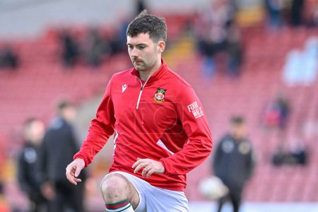 Photo for Thomas O'Connor of Wrexham warms up ahead of the match, during the Sky Bet League 2 match Wrexham vs Crawley Town at SToK Cae Ras, Wrexham, United Kingdom, 9th April 202 - Royalty Free Image