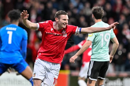 Photo for Paul Mullin of Wrexham celebrates his goal to make it 2-0 Wrexham, during the Sky Bet League 2 match Wrexham vs Crawley Town at SToK Cae Ras, Wrexham, United Kingdom, 9th April 202 - Royalty Free Image