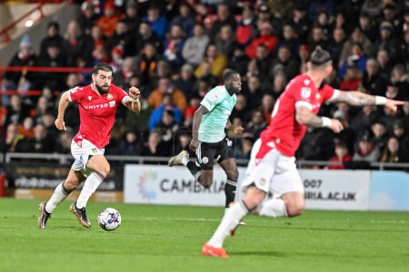 Photo for Elliot Lee of Wrexham breaks forward, during the Sky Bet League 2 match Wrexham vs Crawley Town at SToK Cae Ras, Wrexham, United Kingdom, 9th April 202 - Royalty Free Image