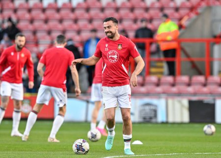 Photo for Eoghan O'Connell of Wrexham warms up ahead of the match, during the Sky Bet League 2 match Wrexham vs Crawley Town at SToK Cae Ras, Wrexham, United Kingdom, 9th April 202 - Royalty Free Image