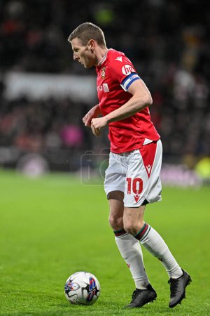 Photo for Paul Mullin of Wrexham in action, during the Sky Bet League 2 match Wrexham vs Crawley Town at SToK Cae Ras, Wrexham, United Kingdom, 9th April 202 - Royalty Free Image