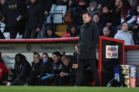Photo for Neill Collins Head coach of Barnsley looks on during the Sky Bet League 1 match Stevenage vs Barnsley at Lamex Stadium, Stevenage, United Kingdom, 9th April 202 - Royalty Free Image