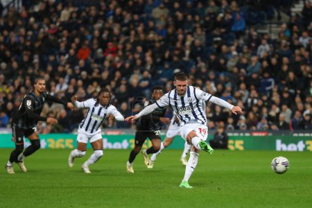 Photo for John Swift of West Bromwich Albion strikes the West Bromwich Albion penalty to make it 2-0 West Bromwich Albion, during the Sky Bet Championship match West Bromwich Albion vs Rotherham United at The Hawthorns, West Bromwich, United Kingdom, 10th Apri - Royalty Free Image