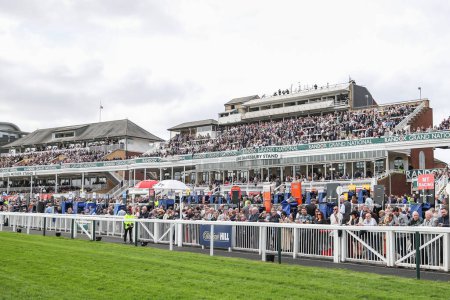 Photo for The Stands are filling up ahead of the first race of the day during the Randox Grand National 2024 Opening Day at Aintree Racecourse, Liverpool, United Kingdom, 11th April 202 - Royalty Free Image
