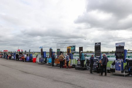 Photo for Bookmakers stand ready ahead of the Randox Grand National 2024 Opening Day at Aintree Racecourse, Liverpool, United Kingdom, 11th April 202 - Royalty Free Image